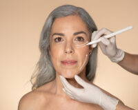 Liquid Facelift vs. Surgical Facelift: Weighing Your Options